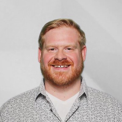 a headshot of Brenden